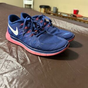 Nike Woman’s Navy and Coral Running Shoes